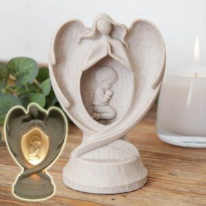 Hiekkaenkeli + lapsi valolla